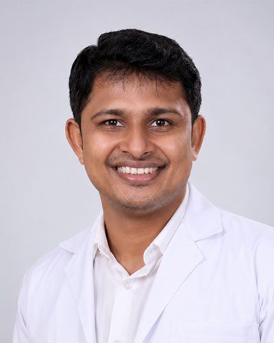 Dr. ARUN TOM
