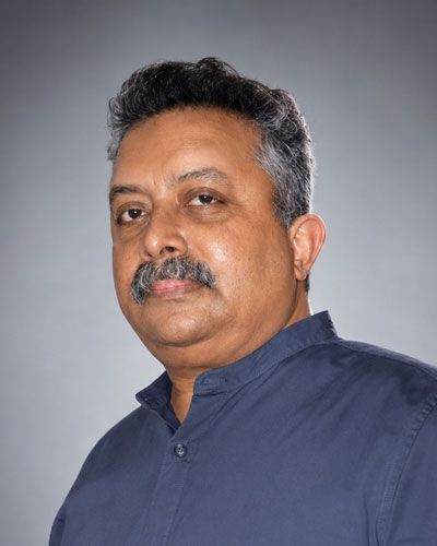 DR. TOJAN CHACKO